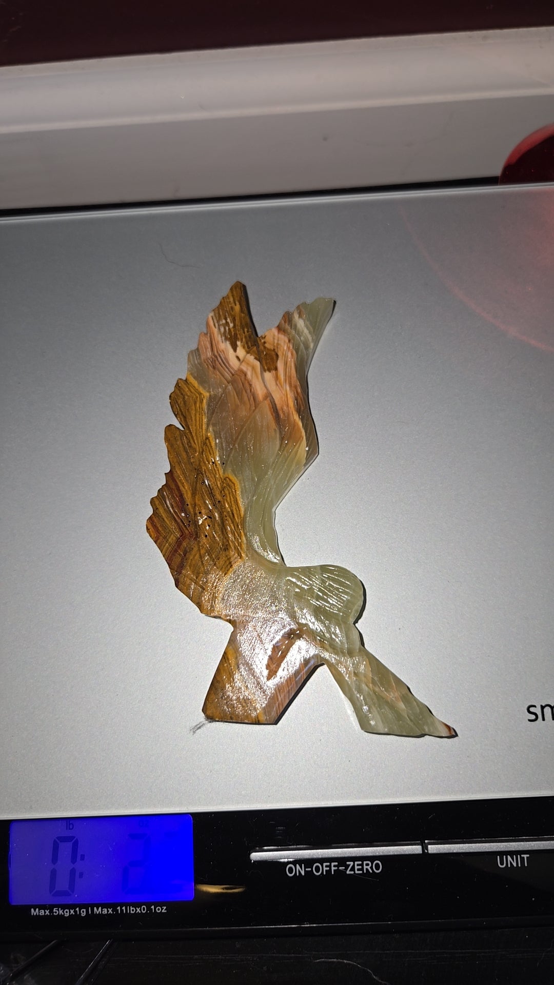 Green onyx angel wings carving