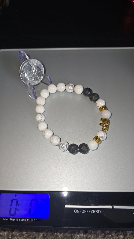 Howlite and Lava Stone bracelet w/gold elephant charm