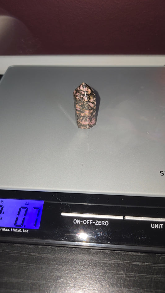 Tiny rhodonite tower